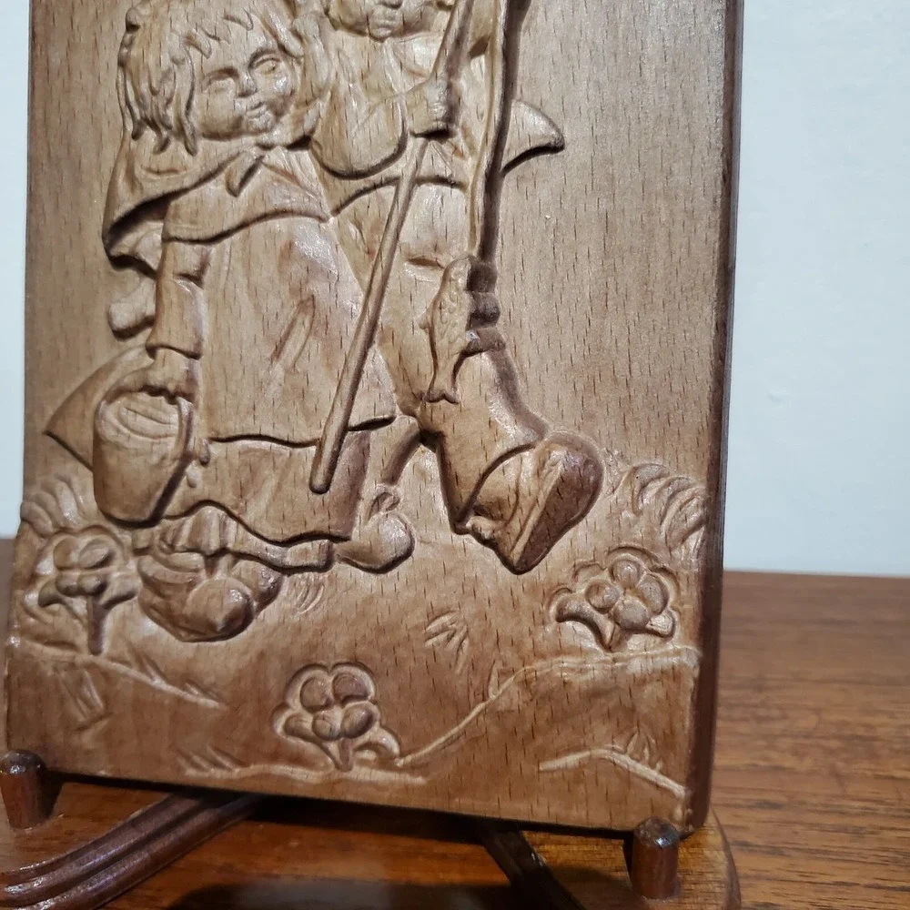 Toni Baur‎ carved wooden wall hanging, boy and girl with fishing pole and fish